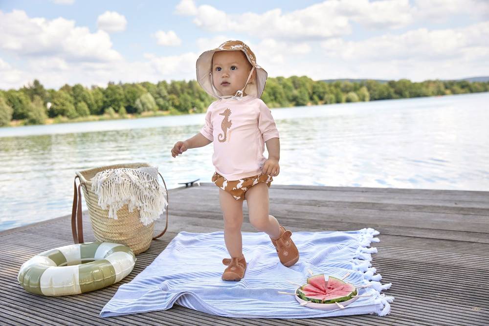 Mädchen mit Schwimmwindel "Seahorse" in carmel und rosé von Lässig