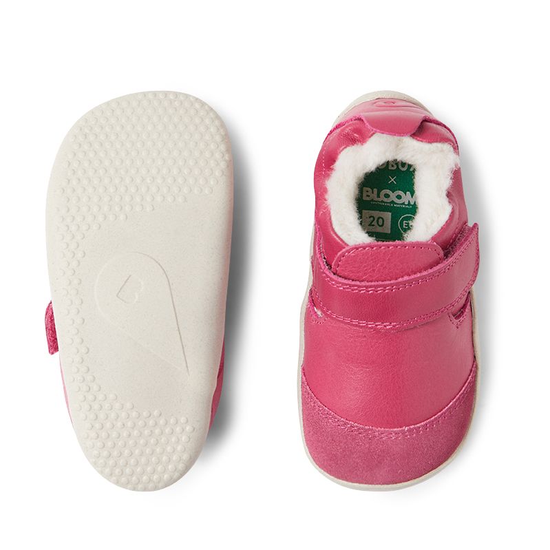 Sohle und Draufsicht des Lauflernschuhs in Pink mit Merinofutter