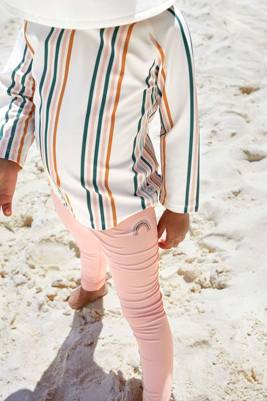 Kind mit UV-Leggings "Pink" von LÄSSIG 