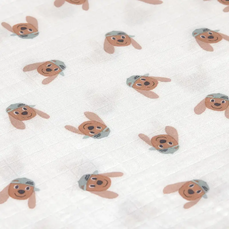 Lässig Mulltuch in Offwhite mit frechen Hunden mit Basecap